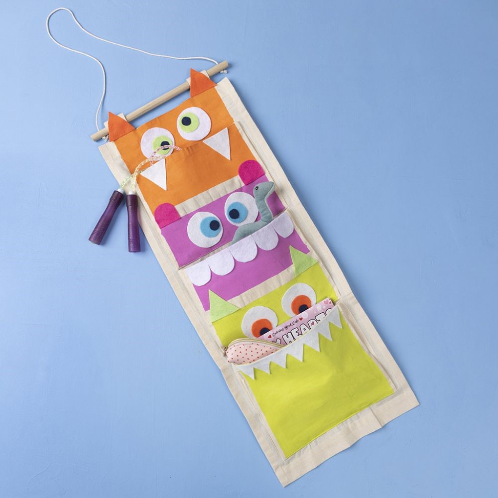 Hangende organiser met hongerige monsters