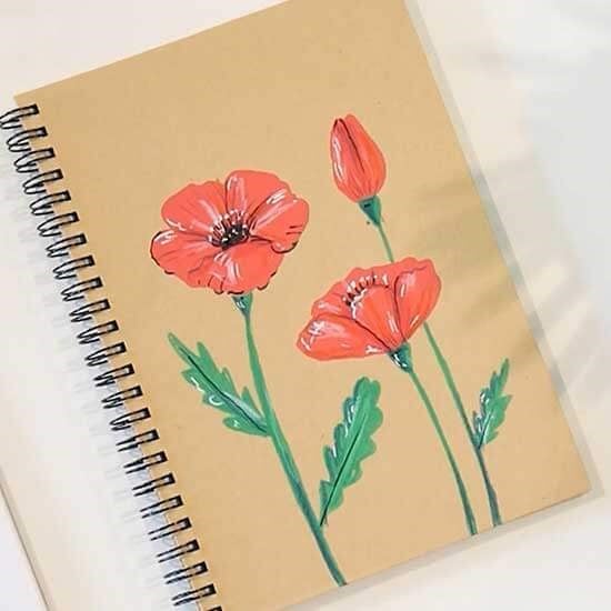 tekening van een klaproos op bruin kraft papier